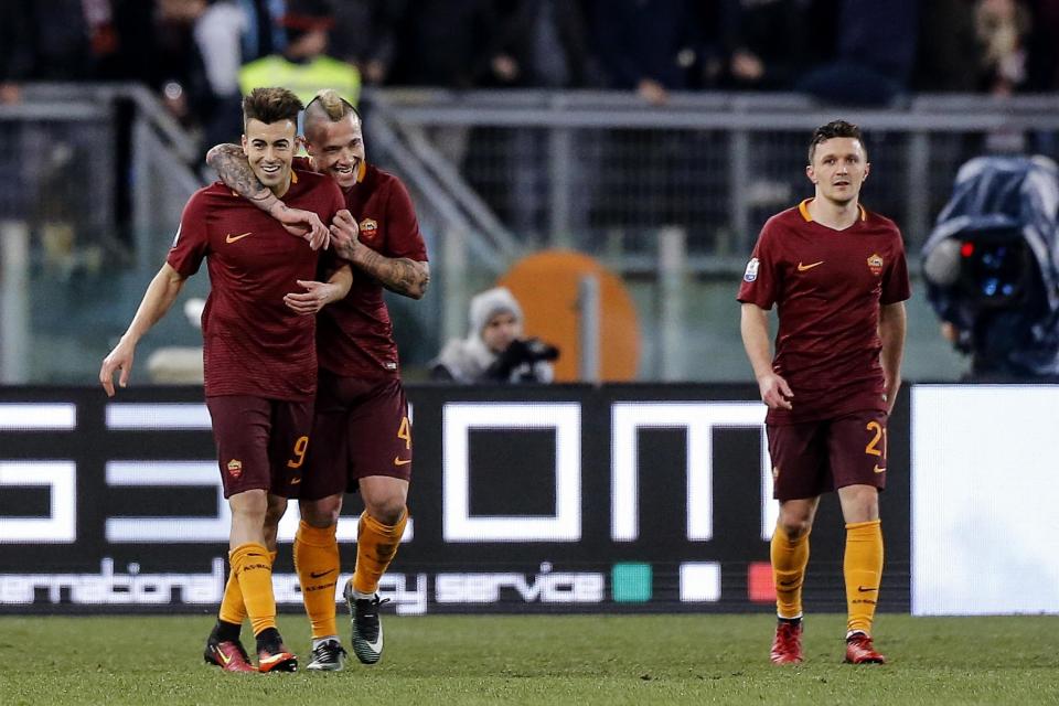 Roma's Stephan El Shaarawy, left, celebrates with his teammate Radja Nainggolan after scoring during an Italian Cup, round of 16, soccer match between Roma and Sampdoria, at Rome's Olympic stadium, Thursday, Jan. 19, 2017. (Angelo Carconi/ANSA via AP)