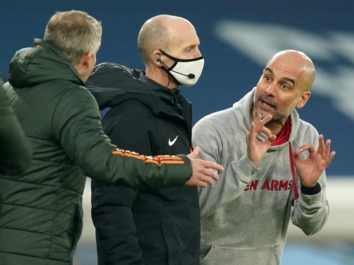 <p>Pep Guardiola speaks to Ole Gunnar Solskjaer on the touchline</p> (POOL/AFP via Getty Images)