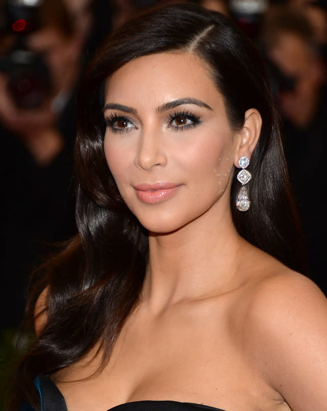 She has some of the best hair in the business, but Kim Kardashian's enviable locks come at a high price. ''I am so bad at doing my own hair - I always use a hairdresser,'' Kim told marie claire Australia. ''Anytime you see a wave or a curl in my hair, you know I haven't done it myself! At the most, I can put it in a ponytail, but that's where my expertise stops." However, the actress tries to refrain from styling her own hair on her days off, and says she always changes her shampoo and conditioner to "shock" the hair. ''If you use the same stuff every day, your hair gets used to it and doesn't give the same bounce and shiny affect,'' explains Kardashian.