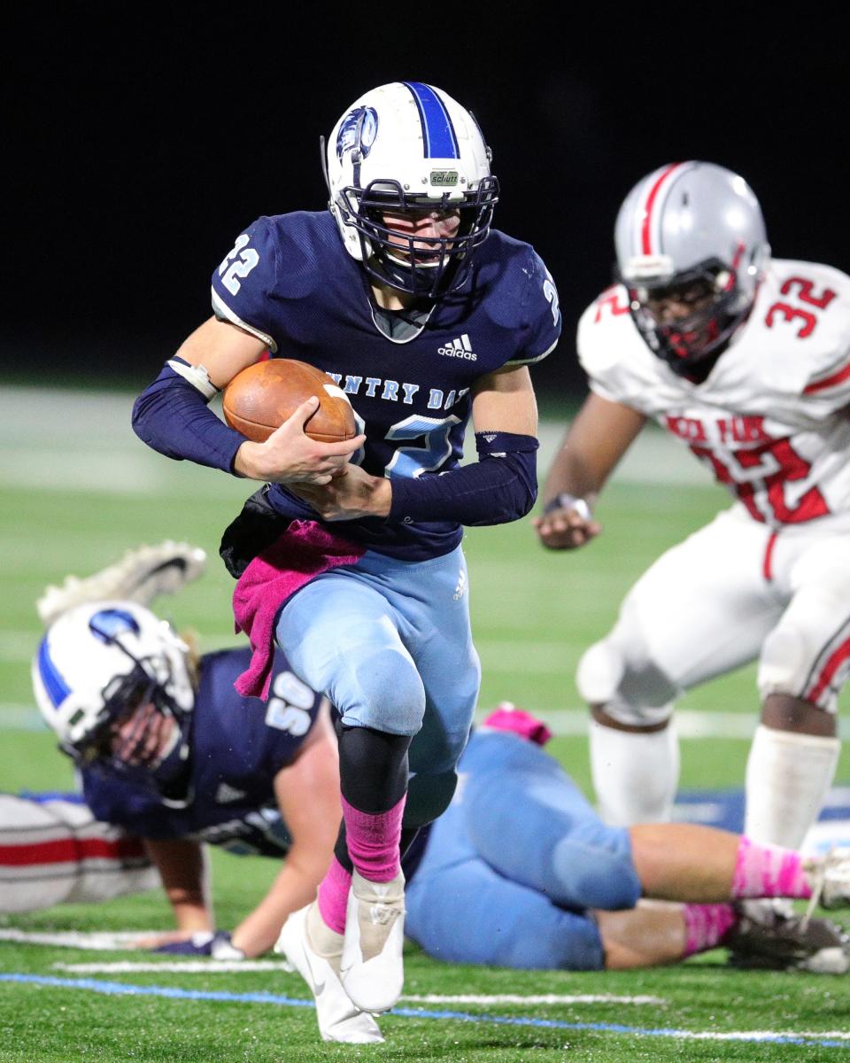 CCDS fullback Ryan Coyle runs for a first down in the game between Deer Park and CCD High School Oct. 30, 2021. Coyle returns for his sophomore season.