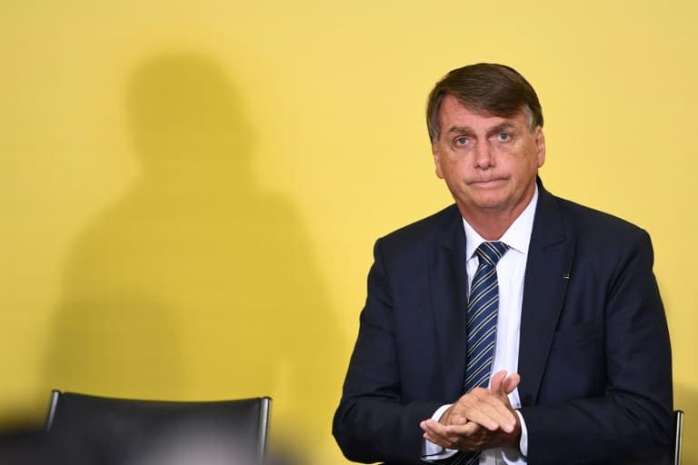 Le président brésilien Jair Bolsonaro, le 25 mars 2022 à Brasilia - EVARISTO SA © 2019 AFP