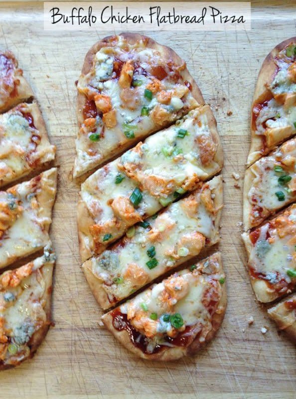 <p>From Valerie's Kitchen</p><p>These incredibly flavorful little flatbread pizzas are ready, from start to finish, in 20 minutes.</p><p><strong>Get the recipe: <a href="http://www.fromvalerieskitchen.com/2014/10/buffalo-chicken-flatbread-pizza/" rel="nofollow noopener" target="_blank" data-ylk="slk:Buffalo Chicken Flatbread Pizza;elm:context_link;itc:0;sec:content-canvas" class="link rapid-noclick-resp">Buffalo Chicken Flatbread Pizza</a></strong></p>