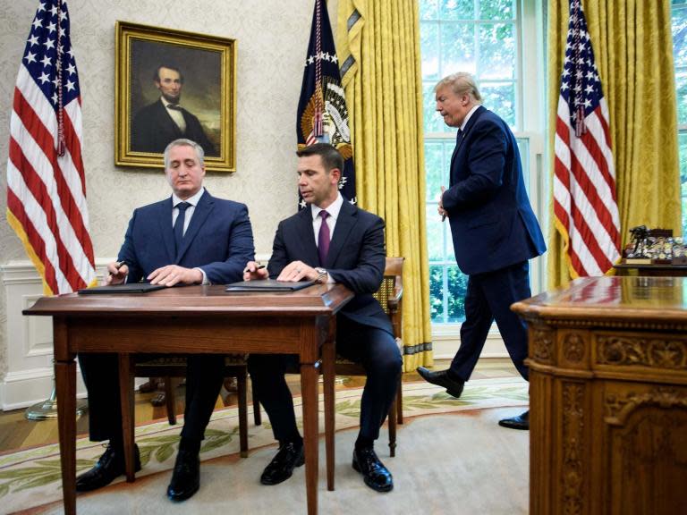 The Trump administration has struck a highly controversial deal with Guatemala, which will prevent some migrants fleeing their home countries from submitting asylum applications to the US.Refugees travelling to the US who enter Guatemala, including Salvadorans and Hondurans, will now be required to apply for asylum protection from the Central American nation instead of at the US border.Under the deal Guatemala has been declared a so-called “safe third country”.The Central American nation and the US have been negotiating the deal for months.Donald Trump earlier threatened to place trade tariffs on Guatemala if an agreement wasn’t reached.“We’ll either do tariffs or we’ll do something. We’re looking at something very severe with respect to Guatemala,” the US president said on Wednesday.Jimmy Morales, Guatemala’s president, said the agreement would allow the country to avoid “drastic sanctions ... many of them designed to strongly punish our economy, such as taxes on remittances that our brothers send daily, as well as the imposition of tariffs on our export goods and migratory restrictions.” As part of the agreement the US will increase access to the the H-2A visa program for temporary agricultural workers from Guatemala. The country’s government said its labour ministry would, in the coming days, ”start issuing work visas in the agriculture industry, which will allow Guatemalans to travel legally to the United States, to avoid being victims of criminal organisations, to work temporarily and then return to Guatemala, which will strengthen family unity.”“We have long been working with Guatemala and now we can do it the right way.” Mr Trump said.“This landmark agreement will put the coyotes and smugglers out of business.”Despite the president’s optimism it remains unclear how the agreement will take effect. Guatemala’s constitutional court has granted three injunctions preventing its government from entering into a deal without approval of the country’s congress and Mr Morales himself has questioned the concept of a “safe third country”, which forms the basis of the agreement.“Where does that term exist?” he asked reporters on Friday, hours before the deal was struck.”It does not exist, it is a colloquial term. No agreement exists that is called ‘safe third country.”Rights groups have condemned the deal, with multiple experts questioning its legality.Jordan Rodas, a human rights prosecutor, said his team was studying the agreement and whether Enrique Degenhart, Guatemala’s interior minister, had the authority to sign it.Amnesty International condemned the deal, saying ”any attempts to force families and individuals fleeing their home countries to seek safety in Guatemala are outrageous.”Rights groups and student organisations rallied against the agreement in Guatemala City, gathering in front of the constitutional court.Many believe the nation, which is mired in poverty and unemployment, has no capacity to take in refugees.The problems of homelessness, severe drought, gang violence and unemployment which are endemic in El Salvador and Honduras are also present in Guatemala.Eliot Engel, a Democrat who chairs the House Committee on Foreign Affairs said Mr Trump’s decision to sign the agreement was “cruel and immoral.”‘’It is also illegal,” he added. “Simply put, Guatemala is not a safe country for refugees and asylum seekers, as the law requires.”The president was asked on Friday if he expected to reach similar agreements with Honduras and El Salvador.He replied, “I do indeed.” Additional reporting by agencies