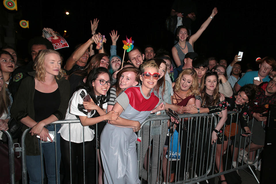 <p>Katy Perry posed with her fans following a private performance at the Water Rats club in London, where she <a rel="nofollow" href="https://www.yahoo.com/celebrity/katy-perry-chokes-dedicating-song-225100943.html" data-ylk="slk:got emotional;elm:context_link;itc:0;sec:content-canvas;outcm:mb_qualified_link;_E:mb_qualified_link;ct:story;" class="link  yahoo-link">got emotional</a> while dedicating “Part of Me” to the victims of the Manchester bombing. (Photo: Ricky Vigil M/GC Images) </p>