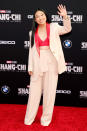 <p>Also at the world premiere of <em>Shang-Chi and the Legend Of the Ten Rings, </em>Awkwafina waves to fans as she hits the red carpet.</p>