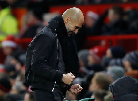 Soccer Football - Premier League - Manchester United vs Manchester City - Old Trafford, Manchester, Britain - December 10, 2017 Manchester City manager Pep Guardiola celebrates their second goal Action Images via Reuters/Carl Recine