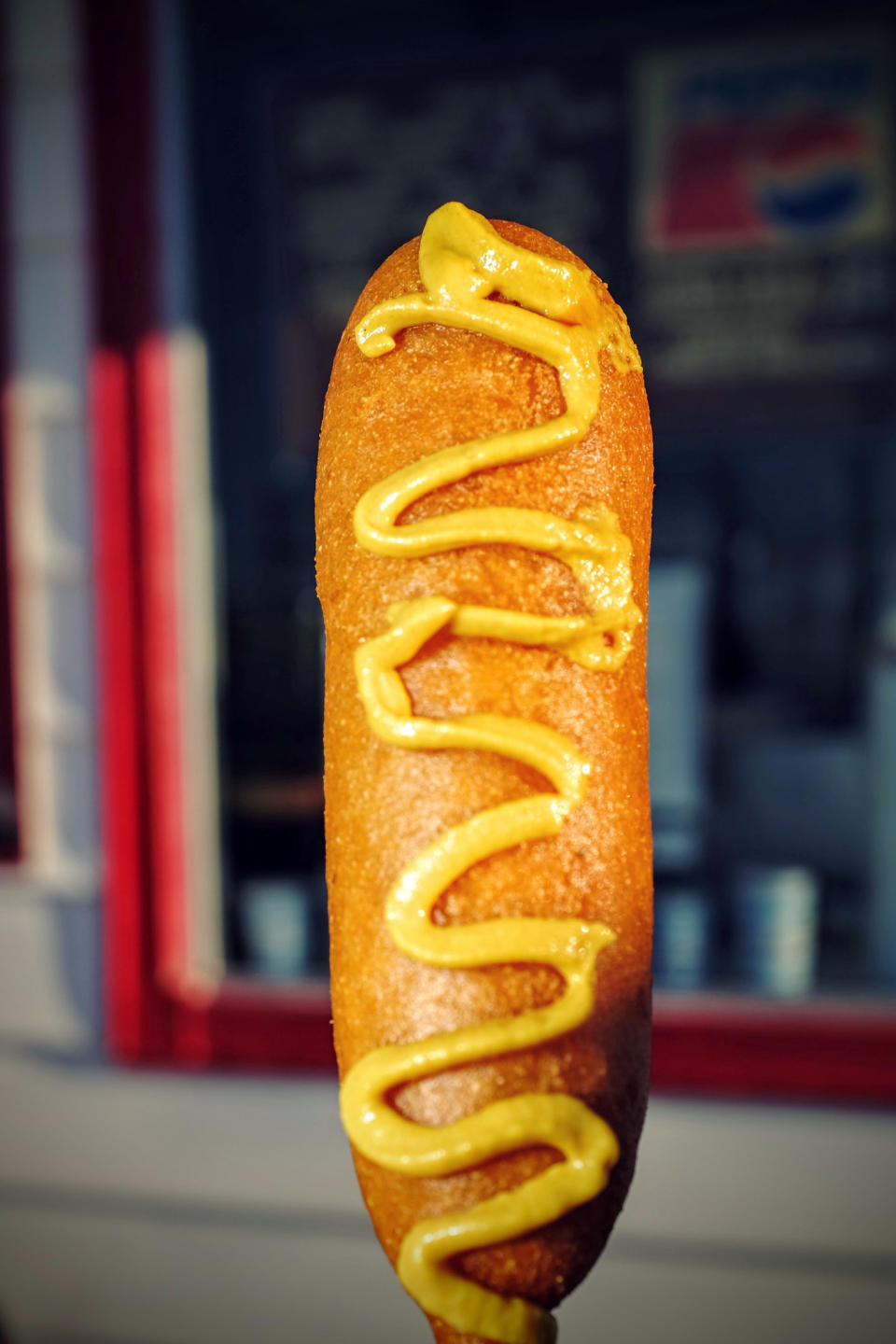 Mustard on a corn dog.