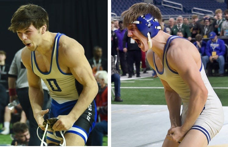 Cameron Chinavare (left) and Kade Kluce of Dundee celebrate after winning individual state wrestling championships. They have been named co-Wrestlers of the Year for the Monroe County Region.