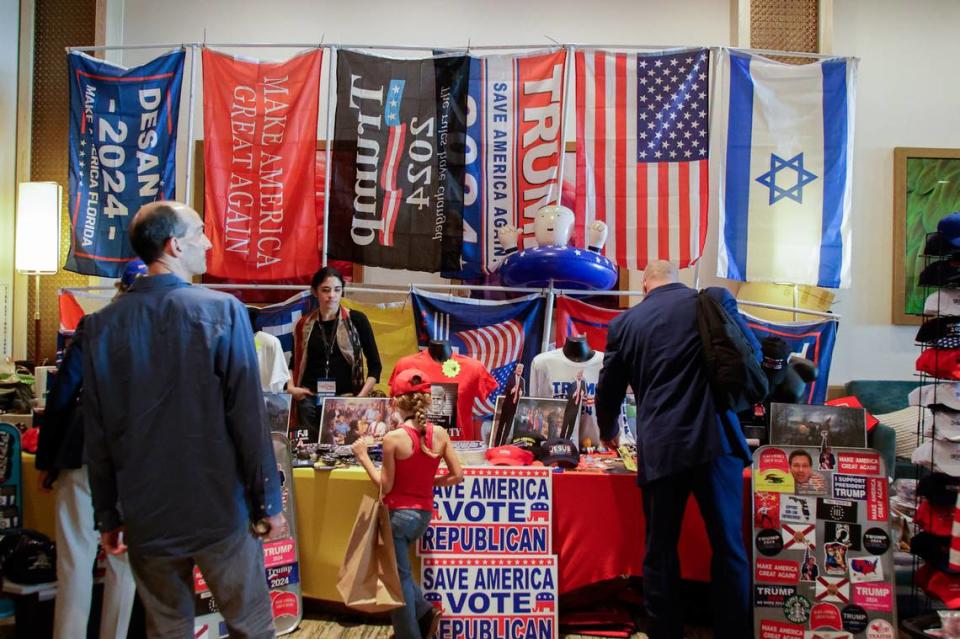 Donald Trump and MAGA merchandise are seen in a vendor booth during the Florida Freedom Summit on Saturday, Nov. 4, 2023 in Orlando.