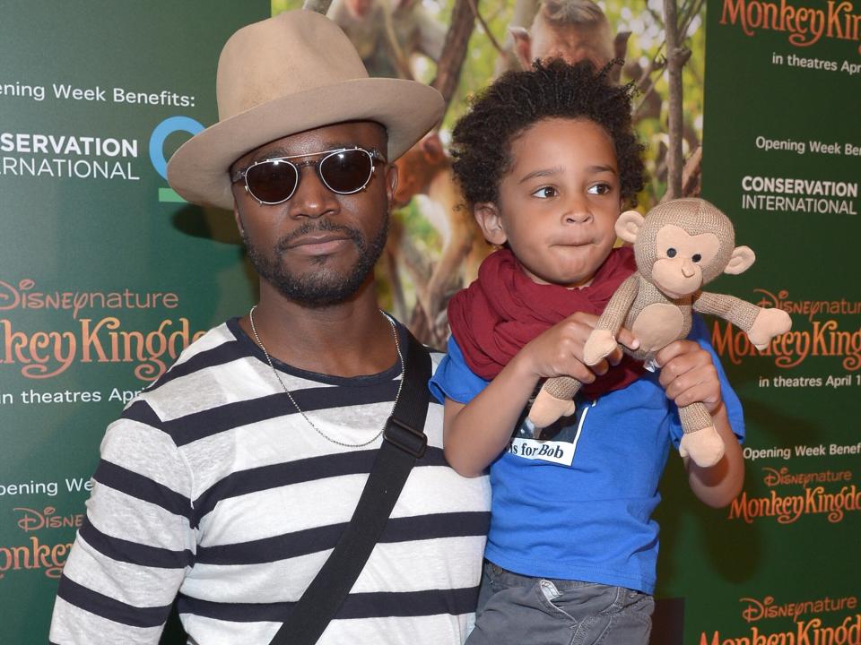 Taye Diggs (L) and son Walker Diggs attend the world premiere Of Disney's "Monkey Kingdom" at Pacific Theatres at The Grove on April 12, 2015 in Los Angeles, California