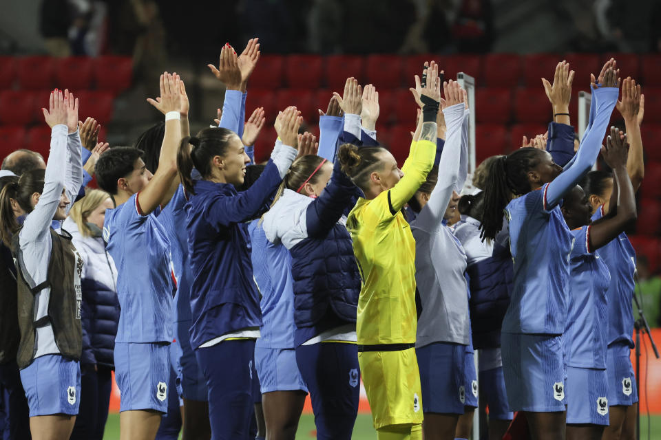 France gesture to their supporters following the Women's World Cup round of 16 soccer match between France and Morocco in Adelaide, Australia, Tuesday, Aug. 8, 2023. (AP Photo/James Elsby)