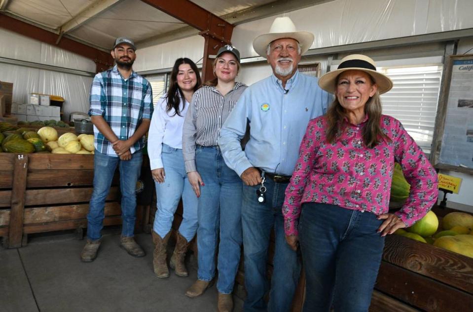 Members of the Del Bosque family left to right, Erik Alfaro, Stephanie Del Bosque, Krystal Del Bosque, Joe Del Bosque and his wife Maria Gloria Del Bosque, photographed at the famiy’s fruit stand Monday, July 15, 2024.