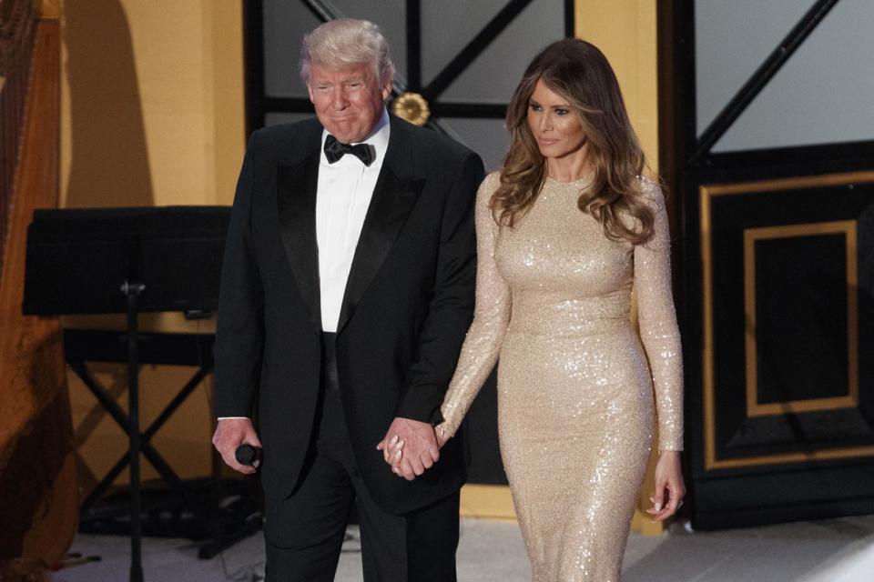 Stepping out: Donald Trump with his wife Melania at the Make America Great Again! Welcome Concert (Evan Vucci/AP)