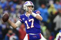 FILE - In this Sunday, Dec. 29, 2019, file photo, Buffalo Bills quarterback Josh Allen (17) throws a pass during the first half of an NFL football game against the New York Jets in Orchard Park, N.Y. In making his NFL playoff debut against the Texans this weekend, second-year Buffalo Bills quarterback Josh Allen gets an opportunity to show how far he's come since his last trip to Houston 14 months ago. (AP Photo/David Dermer, File)