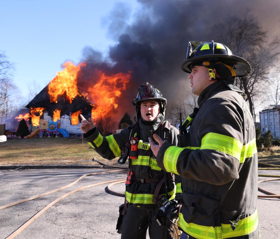 Firefighters from multiple communities battle a two-alarm house fire at 53 Old Bedford Road in East Bridgewater on Sunday, Feb. 4, 2024.