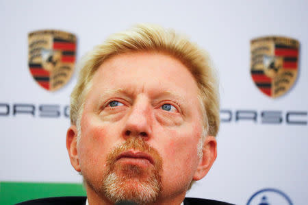 Three-times Wimbledon champion Boris Becker reacts as he is announced as German Tennis Federation's (DTB) new head of men's tennis during a news conference in Frankfurt, Germany, August 23, 2017. REUTERS/Kai Pfaffenbach