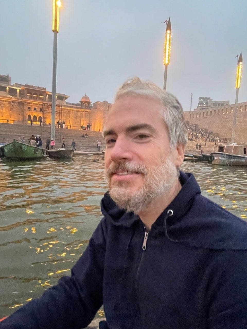 Brian Collins in Varanasi, the sacred city of Shiva. Every sunrise and sunset, priests make offerings to the river with large oil lamps. "It just goes to show how frequently lamps are used in Hindu practices, even outside of Diwali." Collins said.