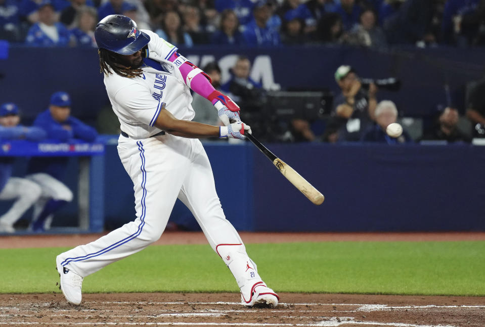 Toronto Blue Jays' Vladimir Guerrero Jr. hits a three-run home run against the Boston Red Sox during the third inning of a baseball game Friday, Sept. 15, 2023, in Toronto. (Chris Young/The Canadian Press via AP)