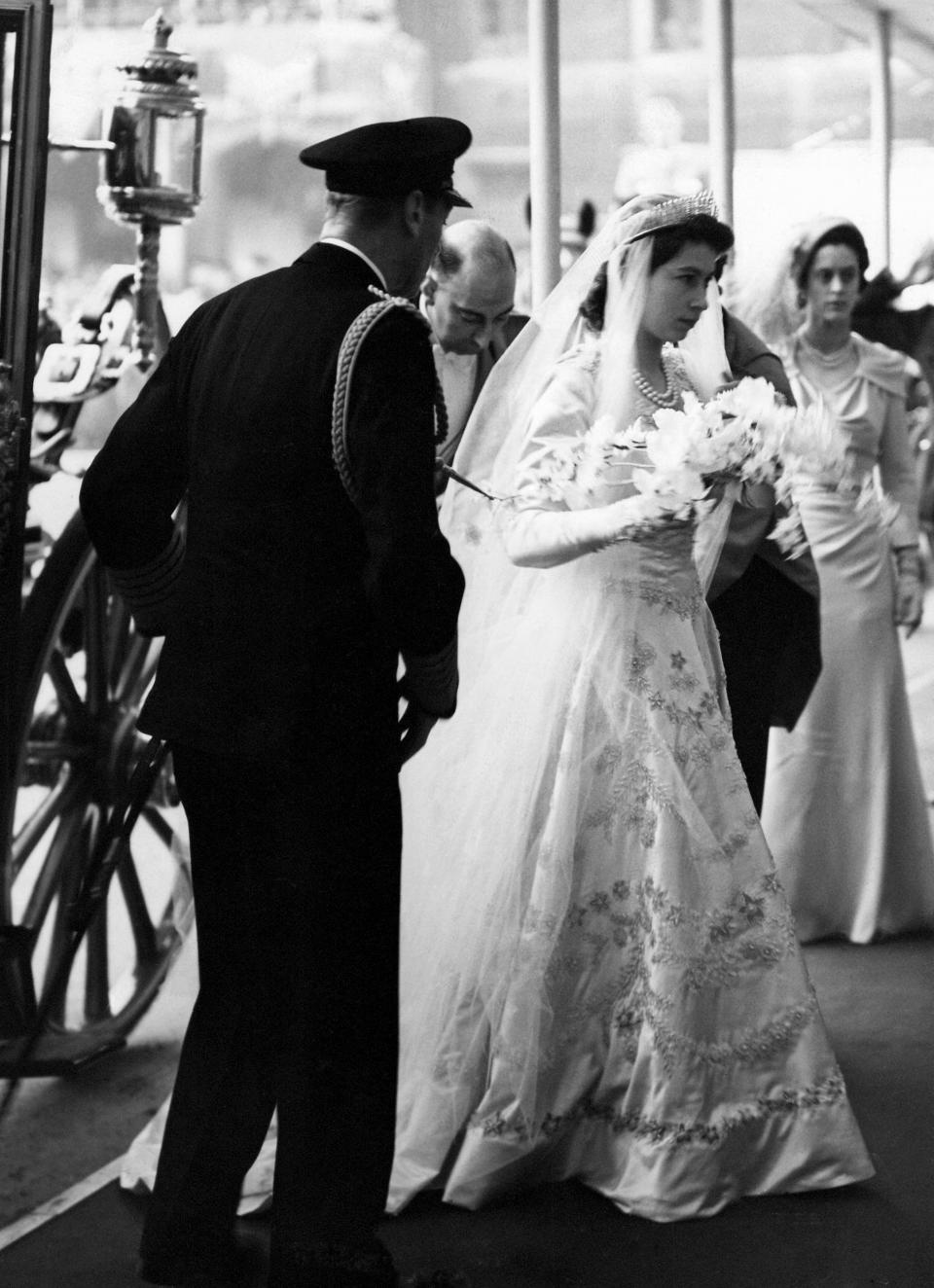 A 21-year-old Princess Elizabeth arriving at Westminster Abbey for her wedding to Philip Mountbatten.