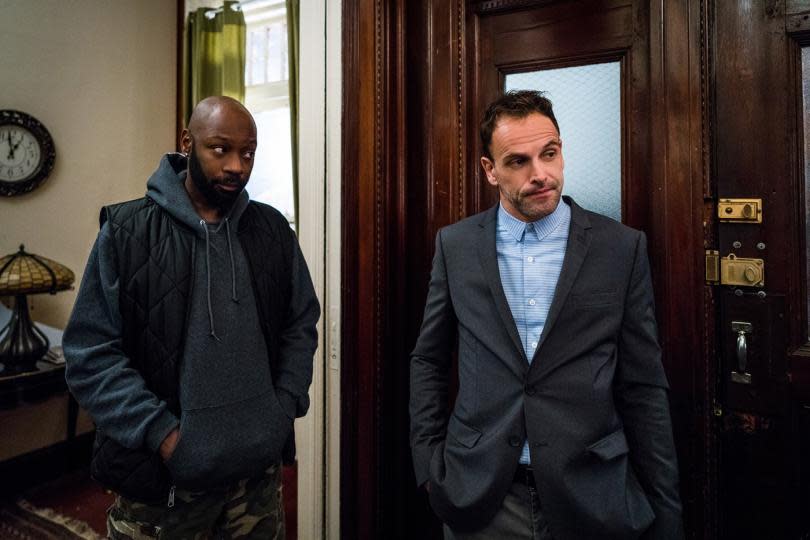 Nelsan Ellis as Shinwell, Jonny Lee Miller as Sherlock