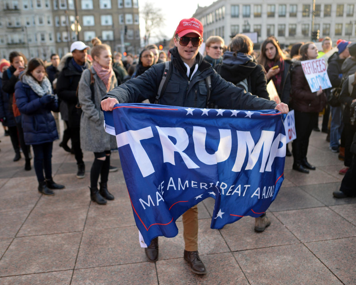 Boston University student Nick Fuentes, 18, of Chicago, a supporter of President Donald Trump, shows up  during a rally at BU against Trump's order that restricts travel to the U.S. on Monday, January 30, 2017. (Christopher Evans/MediaNews Group/Boston Herald via Getty Images)