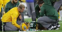 Sep 9, 2018; Green Bay, WI, USA; Green Bay Packers quarterback Aaron Rodgers (12) is tended to by the training staff after being injured during the second quarter of their game against the Chicago Bears at Lambeau Field. Mandatory Credit: Mark Hoffman/Milwaukee Journal Sentinel via USA TODAY NETWORK