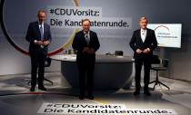 FILE PHOTO: CDU chairmanship candidates hold discussion in Berlin