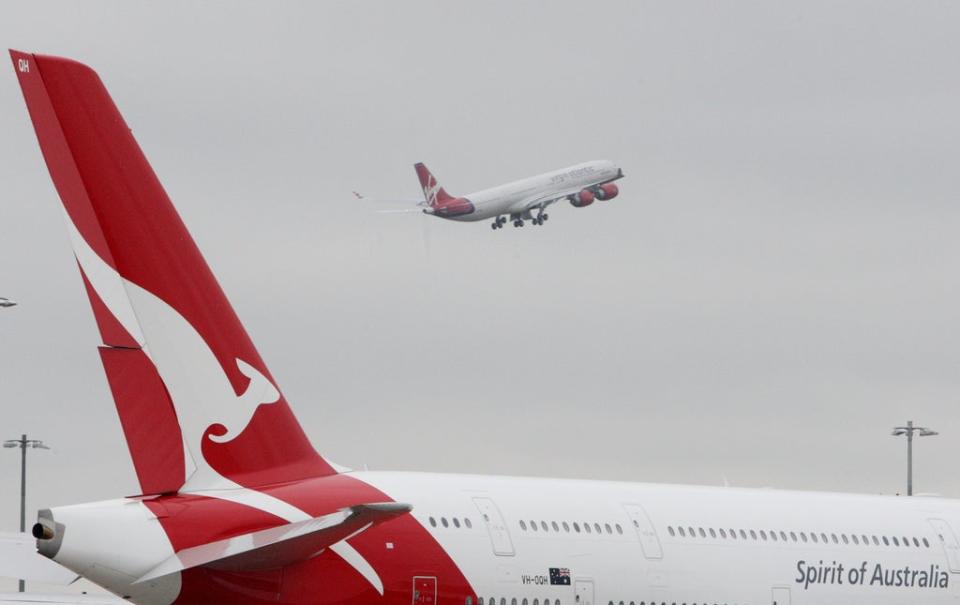 Qantas plans to resume flights between Australian and the UK – and other high-vaccination countries – in December (Steve Parsons/PA) (PA Archive)