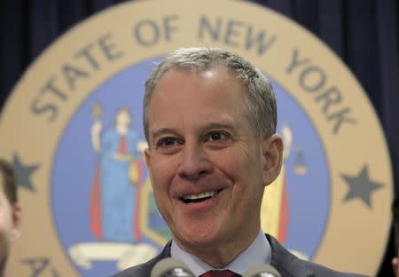 FILE PHOTO: New York Attorney General Eric Schneiderman speaks during a news conference in New York March 21, 2016. REUTERS/Brendan McDermid/File Photo