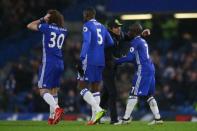 Britain Football Soccer - Chelsea v Swansea City - Premier League - Stamford Bridge - 25/2/17 Chelsea manager Antonio Conte celebrates after the game with N'Golo Kante Reuters / Peter Nicholls Livepic