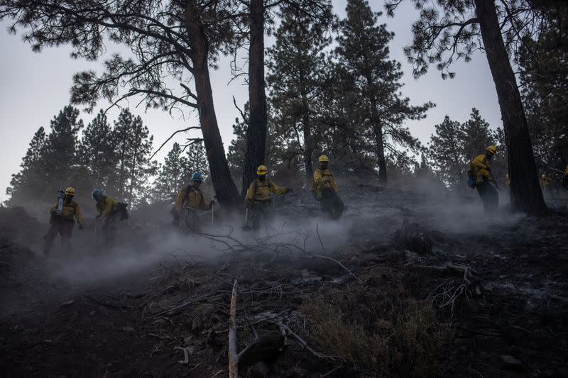 The Wider Image: Oregon inmates find redemption in fighting wildfires