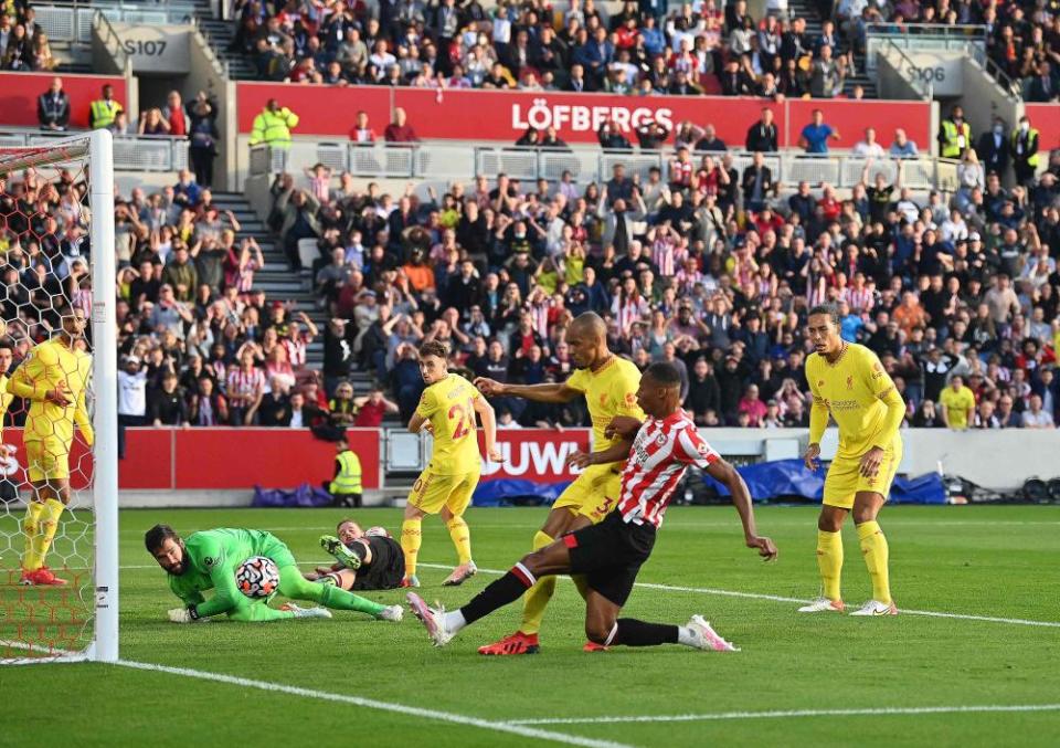 Brentford’s Ethan Pinnock scores the opening goal in the Bees’ 3-3 draw against Liverpool at Brentford Community Stadium in September 2021.