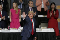 President Donald Trump waves after speaking during a meeting of the Economic Club of New York in New York, Tuesday, Nov. 12, 2019. (AP Photo/Seth Wenig)
