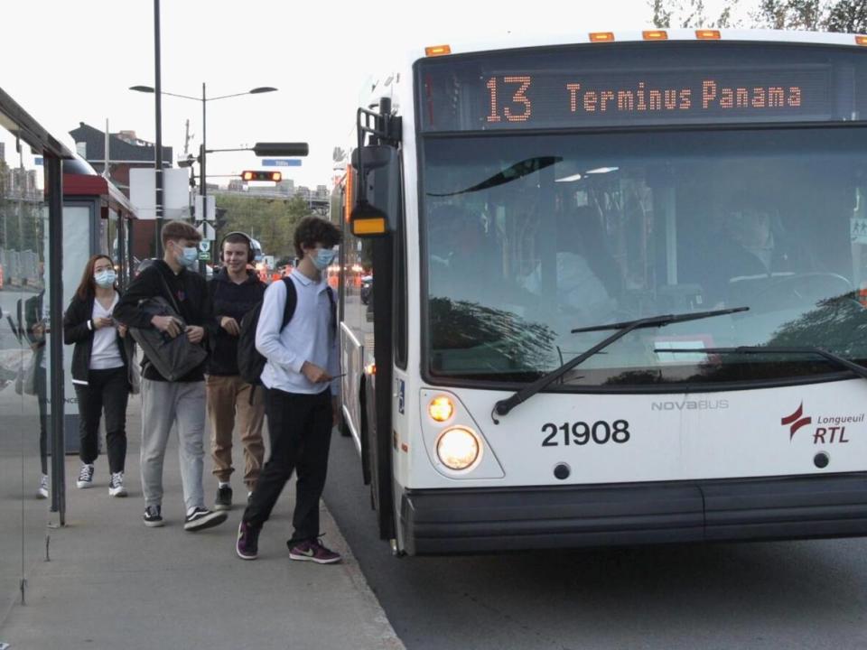 When the REM light-rail network begins service next year, bus service across the Samuel De Champlain Bridge will halt. How those buses will be used is currently being planned. (Matt D'Amours/CBC - image credit)