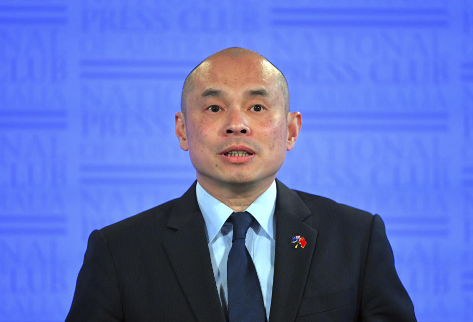 Wang Xining, the Chinese Embassy in Australia's deputy head of mission, speaks at the National Press Club about Australia's call for an independent inquiry into the origins of and international responses to the pandemic in Canberra, Wednesday, Aug. 26, 2020. Wang likens Australia's call for an inquiry into the coronavirus pandemic to the betrayal of Roman dictator Julius Caesar in a Shakespearean tragedy for the benefit of the United States. (Mick Tsikas/AAP Image via AP)