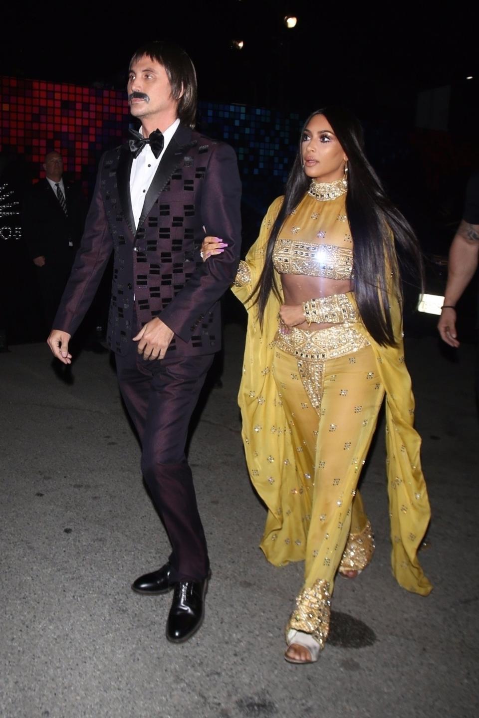 <p>Jonathan Cheban is the Sonny to Kim’s Cher. The BFFs dressed as the iconic duo for the Casamigos Annual Halloween Party, channeling the pair’s 1973 Oscars look. The reality star’s getup was Cher-approved. “Woke up to see you are me 4 [Halloween],” Cher tweeted at Kardashian. “You look BEAUTIFUL little Armenian sister.” (Photo: Backgrid) </p>
