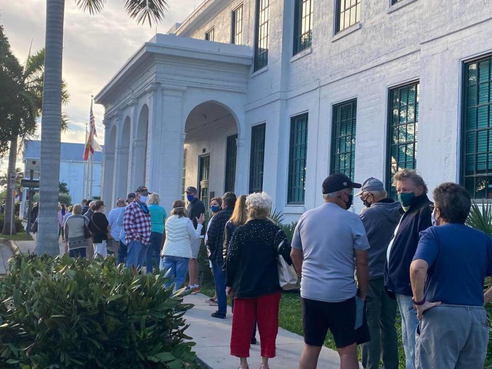 A crowd lined up in Key West on Jan. 6, 2021, outside the offices of the Florida Department of Health in Monroe County after hearing through word of mouth they could sign up for the COVID-19 vaccine. They were told a registration website will become available next week.