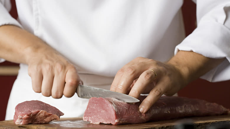 chef chopping meat