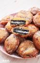 <p>This carnival favorite will be the star of your Halloween party.</p><p>Get the recipe from <a href="https://www.delish.com/cooking/recipe-ideas/a27572812/best-deep-fried-oreos-recipe/" rel="nofollow noopener" target="_blank" data-ylk="slk:Delish;elm:context_link;itc:0;sec:content-canvas" class="link ">Delish</a>.</p>