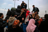 <p>Palestinians in Gaza wait for travel permits to cross into Egypt through the Rafah border crossing after it was opened by Egyptian authorities for humanitarian cases, Feb. 7, 2018. (Photo: Mohammed Saber/EPA-EFE/REX/Shutterstock) </p>