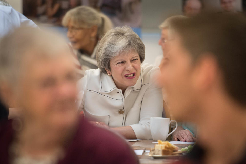 Time for tea – Theresa May at an event before the European Council (Getty)