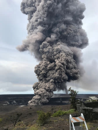 An ash column rises from the Overlook crater at the summit of Kilauea Volcano in Hawaii, May 9, 2018. USGS/Handout via REUTERS