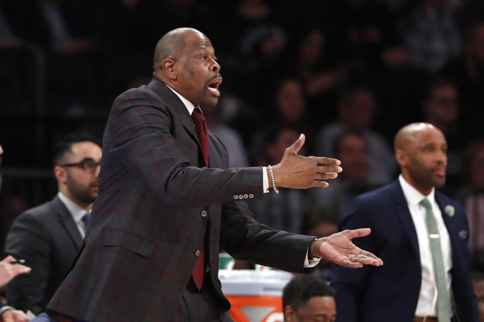 Georgetown coach Patrick Ewing objects after a referee's call during the second half of the team's NCAA college basketball game against St. John's in the first round of the Big East men's tournament Wednesday, March 11, 2020, in New York. (AP Photo/Kathy Willens)