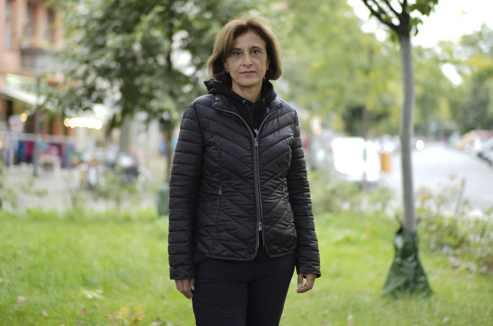 Canan Bayram a German-Kurdish lawyer who was elected to the Bundestag in 2017 for the Green party and run for a second term at the upcoming elections, pose for a photo in Berlin, Germany, Tuesday, Sept. 21, 2021. Hundreds of immigrants are running in Germany's national election on Sunday, raising the possibility of making its next parliament more diverse than ever. While it still might not fully represent the country's overall diversity, where more than a quarter of the population has immigrant roots, it's a step toward a more accurate reflection of society. (AP Photo/Markus Schreiber)