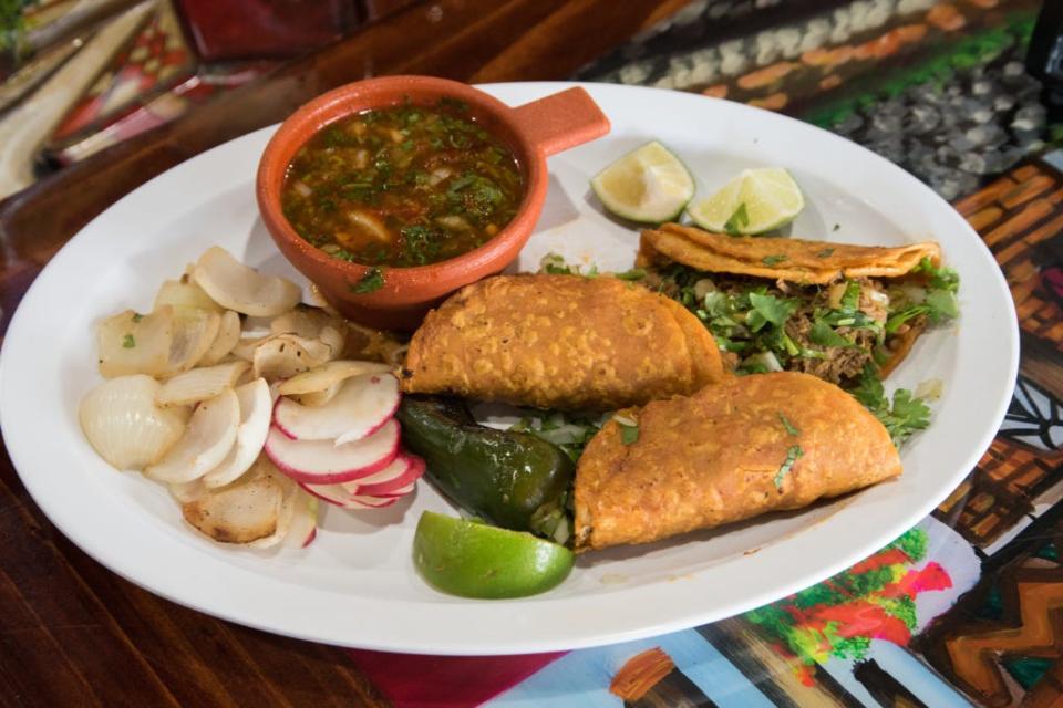 Guadalajara restaurant serves beef birria tacos in Lake Park. You can order them by the taco or by the trio, which is served with dipping broth.