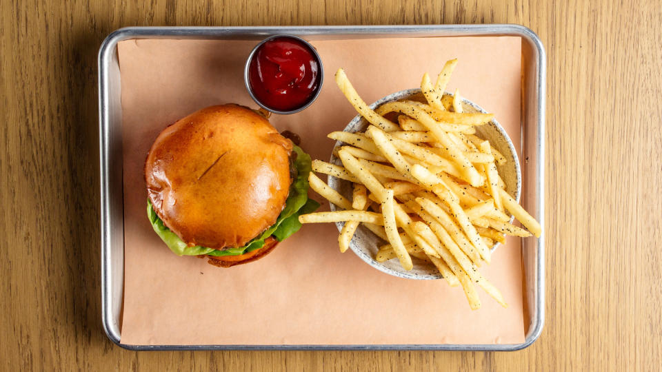 A burger, fries, and ketchup