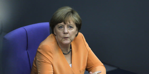 German Chancellor Angela Merkel  attends a debate  on the Greek financial crisis,  at the German parliament , the Bundestag ,  in Berlin, Wednesday, July 1, 2015. (AP Photo/Markus Schreiber) (Photo: )
