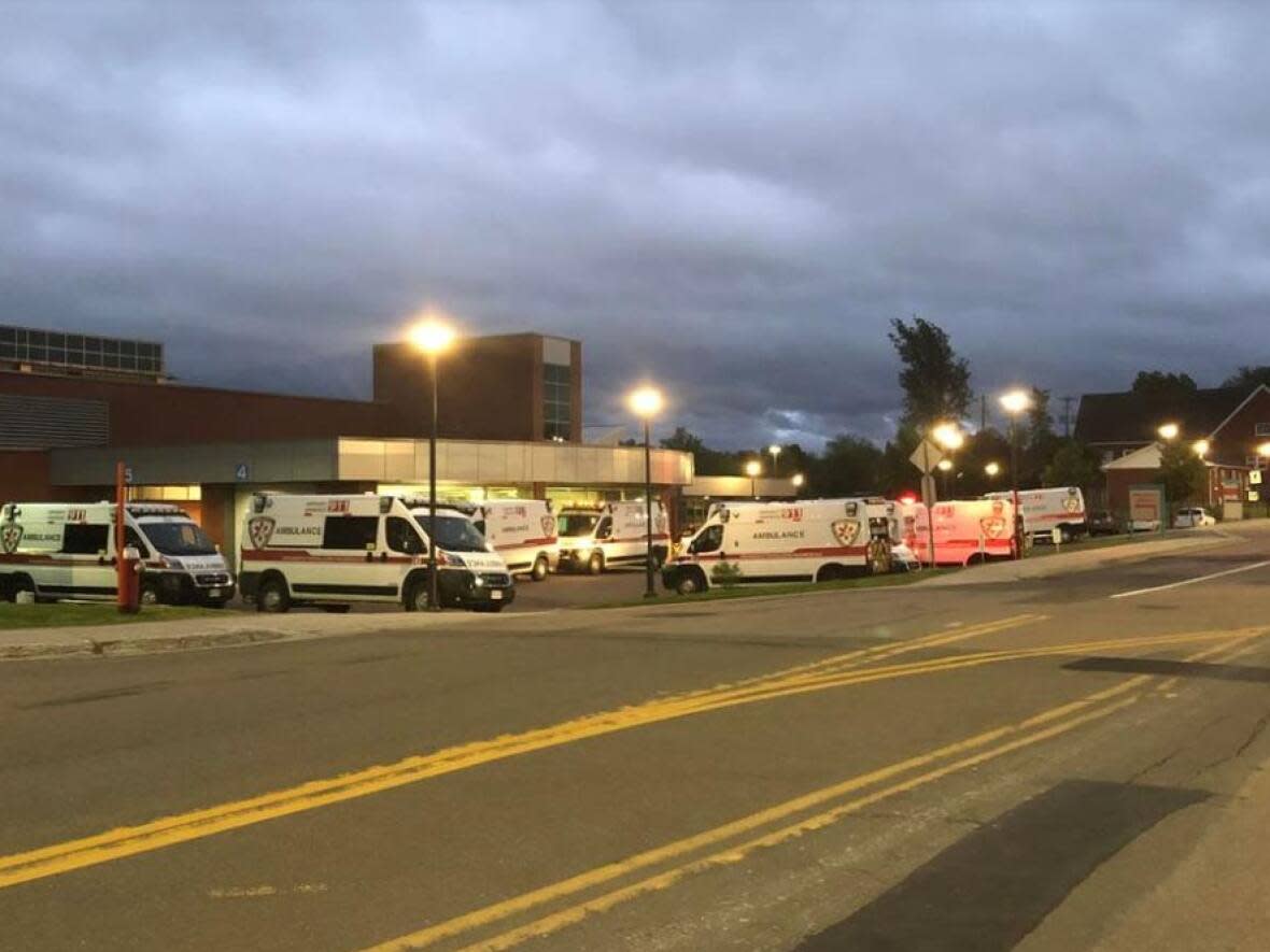 Ambulances parked outside Moncton Hospital on June 27, 2022  (Kevin Ganong - image credit)