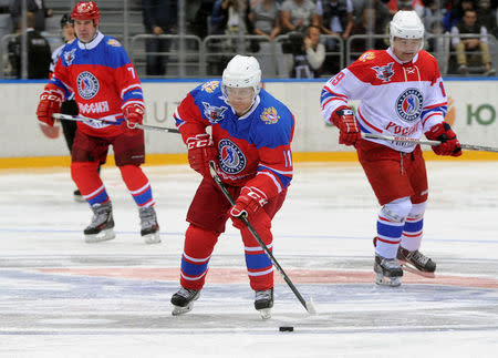 Russian President Vladimir Putin takes part in a gala game of the Night Ice Hockey League in Sochi, Russia, May 10, 2016. Sputnik/Kremlin via Reuters