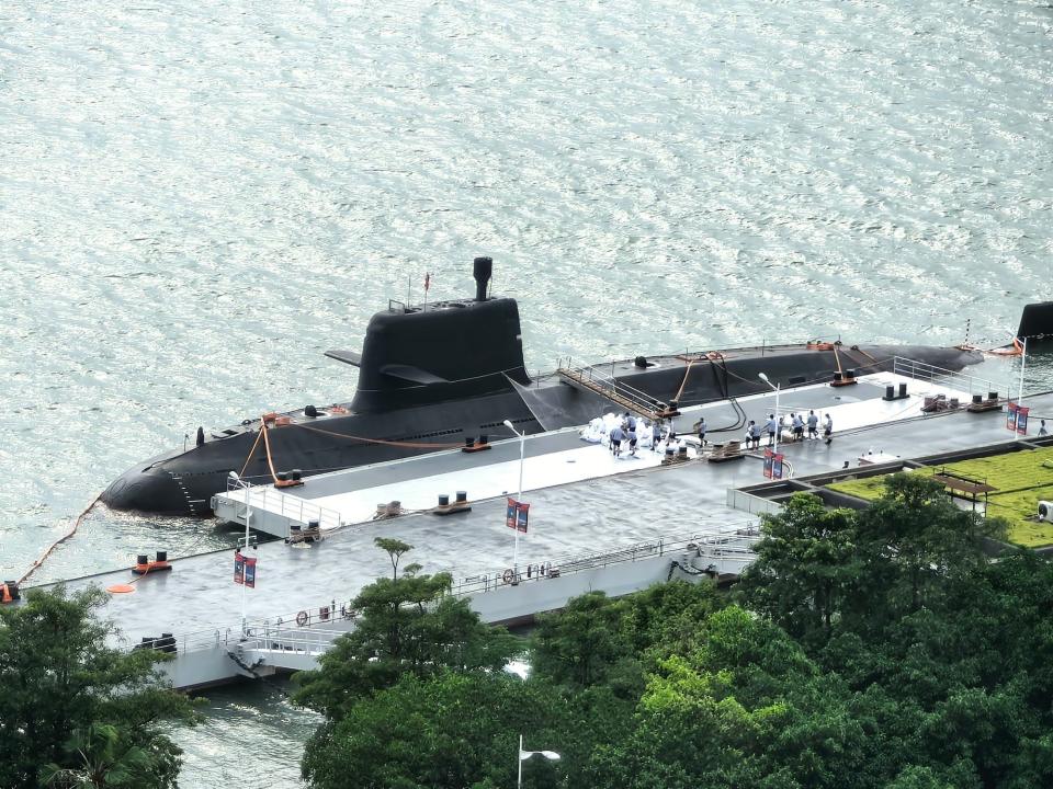 A submarine arrives at a wharf in preparation for the 75th anniversary of the founding of the Chinese People's Liberation Army Navy (PLAN) on April 20, 2024.